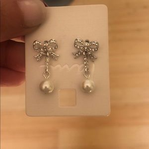 Bowtie and pearl drop earrings